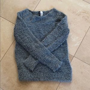 grey fuzzy sweater